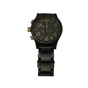 Nixon Black and Gold Chronograph Timepiece